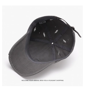 Inside view of distressed grey baseball cap showing 100% cotton fabric and sewing details