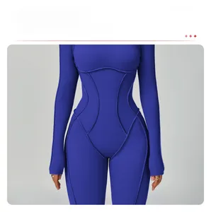 Detail of navy yoga jumpsuit featuring structured stitching and thumbhole sleeves
