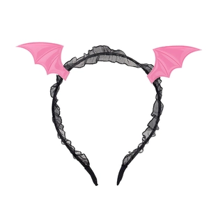 Detailed view of pink bat wing headband with black lace trim and plastic finish