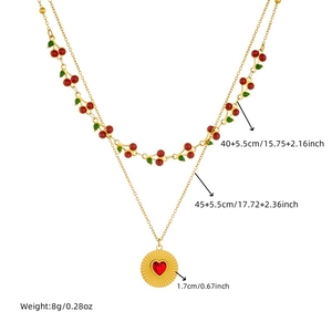 Detailed view of layered cherry necklace with red heart gemstone and weight of 8g