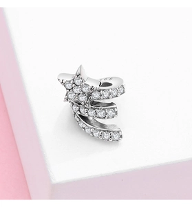Detailed view of S925 sterling silver bead with pavé zircon meteor design and S925 stamp