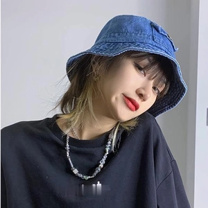 Stylish washed denim bucket hat with side pocket detail for women and men