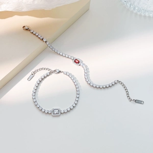 Elegant stainless steel tennis bracelets featuring white and ruby rectangular crystals