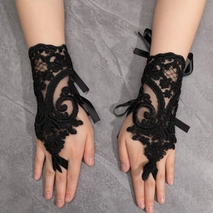 Elegant black lace fingerless gloves with floral embroidery and satin ribbons for Halloween