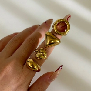 Minimalist gold geometric rings set including heart and oval shapes for women