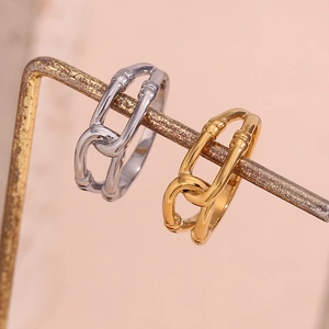Minimalist double-layered hollow intertwined ring in 18K gold and silver finishes