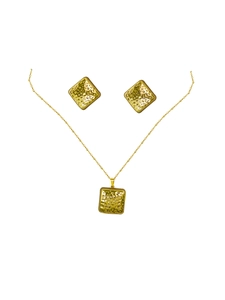 Detailed view of square textured golden necklace and earrings set with refined finish