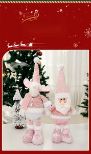 Pink plush Christmas snowman and reindeer dolls with sparkling sequins for festive decor