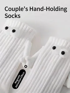 Funny magnetic suction 3D cartoon eyes hand holding socks in white cotton knit