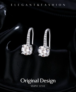 Detail of 1 carat moissanite earrings with 4-prong setting and pavé crystal ear hooks
