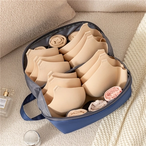 Navy blue portable travel organizer bag for bras and underwear with handle and compartments