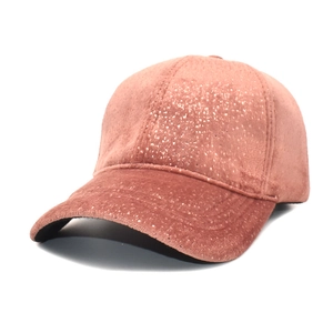 Macro view of women's warm pink velvet baseball cap featuring sparkling sequin texture