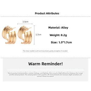 Detail view of gold wave texture stud earrings with 1.5cm by 1.7cm size dimensions