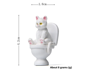 Miniature white resin cat on toilet figurine with dimensions 4.2cm height and 1.8cm width