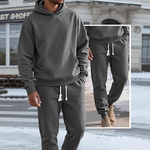 Men's dark grey tracksuit set featuring geometric diamond texture hoodie and joggers