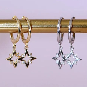 Detailed view of S925 silver star pendant earrings in gold and silver with cubic zirconia