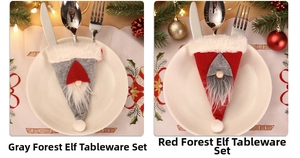 Detail of red and grey gnome cutlery holders made of soft felt for Christmas table decor