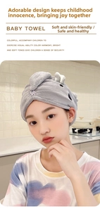 Detailed view of gray cartoon bunny hair drying towel made of thick coral fleece