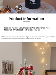 Close-up of mini flocked Christmas tree with LED lights and Merry Christmas red ribbon