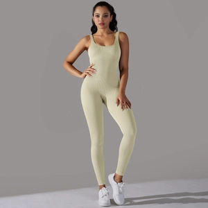 Detail of seamless ribbed knit texture on a square neck yellow athletic bodysuit