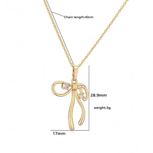 Detailed size specifications for the gold ribbon bow necklace with measurements