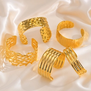 Gold stainless steel multi-layer cuff bracelet set with hammered and textured patterns