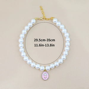 Detail of pearl pet necklace with rose cameo pendant and size measurements