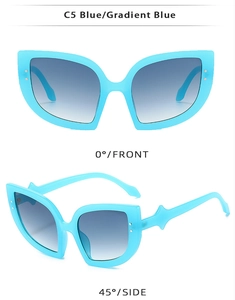 Detail view of cat eye sunglasses in blue gradient lenses and classic rivet frame