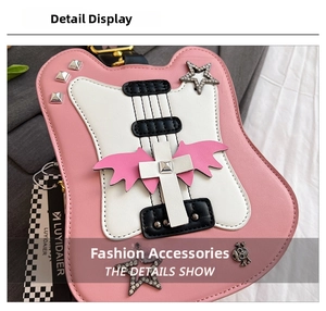 Detailed macro view of pink guitar-shaped crossbody bag with punk style accessories