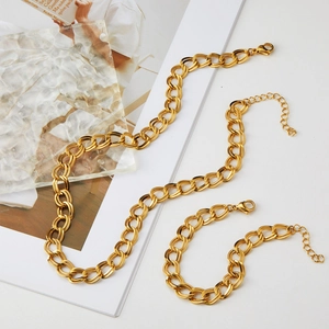 Set collana e bracciale a catena a maglie testurizzate placcate oro 18 carati da donna