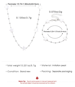 Vue détaillée de l'ensemble collier et bracelet étoile avec perles d'imitation et mesures