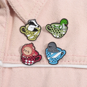 Detailed view of animal tea cup enamel pins on pink denim jacket for fan collections