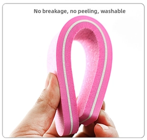 Detail showing the flexible pink and white nail buffer being bent without breaking