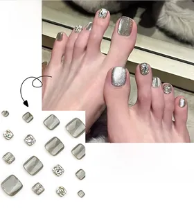 Silver grey cat eye press-on toe nails with rhinestones and glitter finish