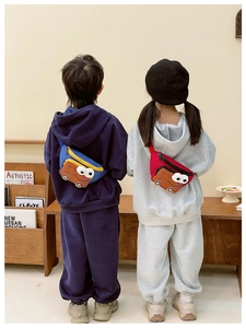 Rear view of children wearing cartoon car waist bags in blue and red canvas fabric