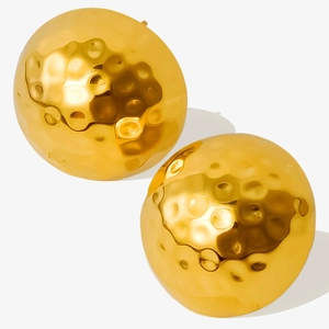 Detail showing 18K gold stainless steel earrings with hammered texture and dome design