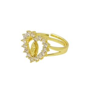 Close-up of golden heart ring with Virgin Mary icon and sparkling zircon accents