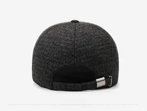 Detail of winter baseball cap rear view with adjustable silver metal buckle and wool texture