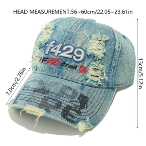 Detailed view of light blue distressed denim cap with embroidery and 1429 number patch