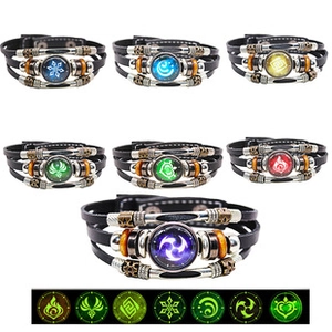 Detail showing various handmade braided leather bracelets with luminous glow features
