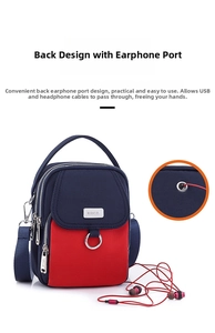 Detail showing back headphone jack and cable port on navy oxford crossbody bag