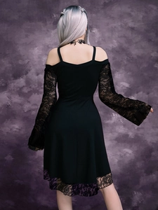 Back view of Gothic black dress featuring lace sleeves and delicate corset lace-up detailing