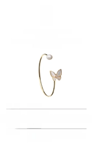 Detail view of 18K gold plated butterfly bracelet with natural baroque freshwater pearl