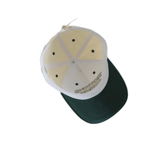 Kids color-block baseball cap in cream and green with embroidered lettering detail