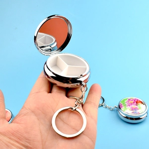 Compact peony pill box with three compartments, built-in mirror and metal keychain