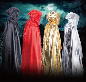 Detailed view of Halloween capes in black, red, gold, and silver satin fabrics