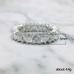 5mm heart-cut cubic zirconia eternity ring in silver finish with macro marble background