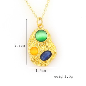 Detail of vintage gold pendant with colorful gems including size and weight dimensions