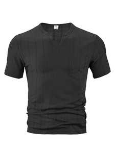 Detail of waffle textured black V-neck t-shirt with chest pocket and size M label
