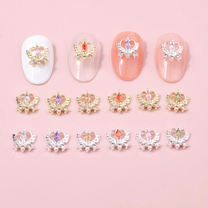 Mix of magic-style horse eye zircon crown and wing charms for DIY nail art decoration